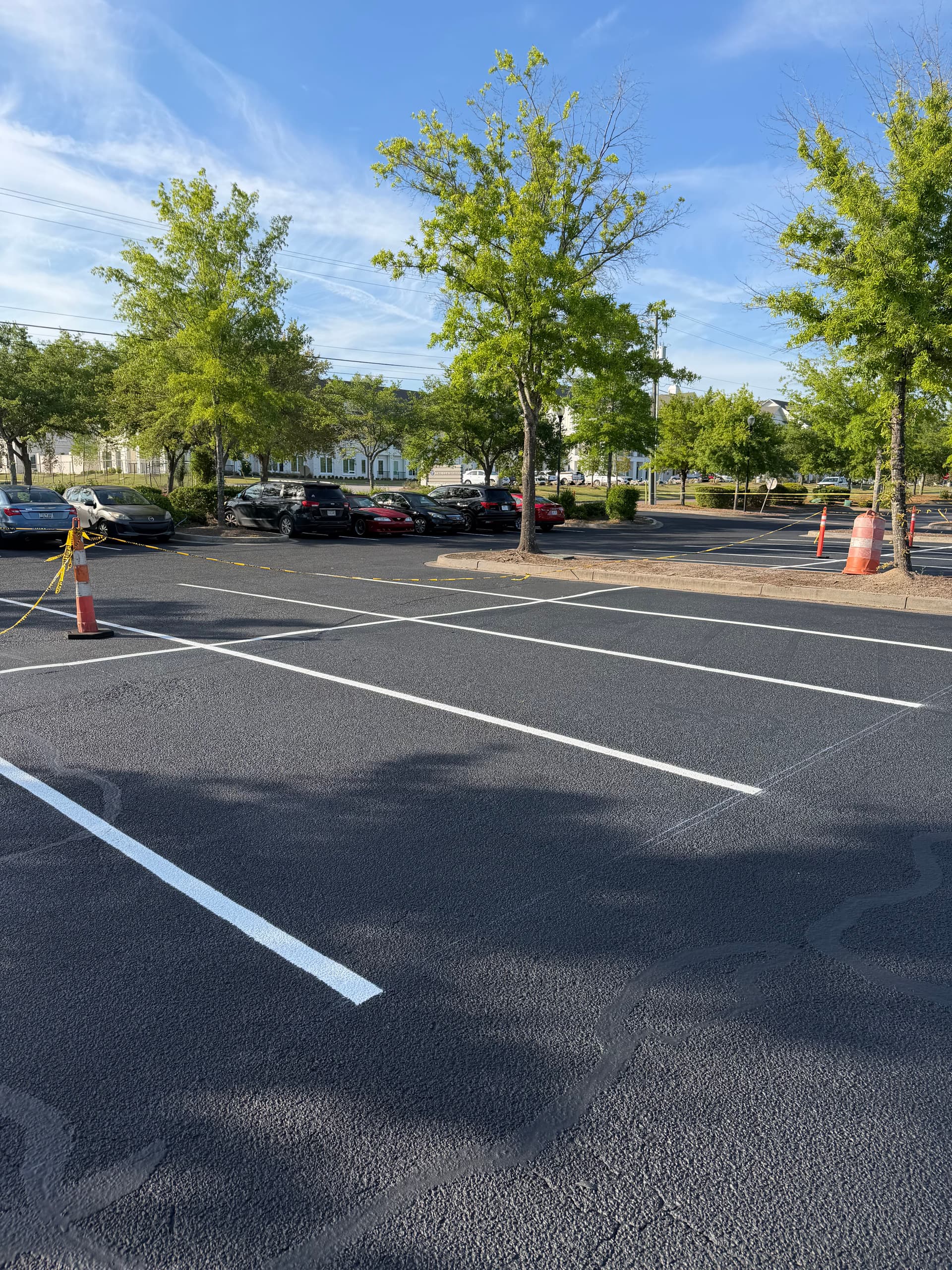 Gallery photos for Shopping Center Parking Lot Gets Full Crack Fill, Seal, and Stripe: Image #1