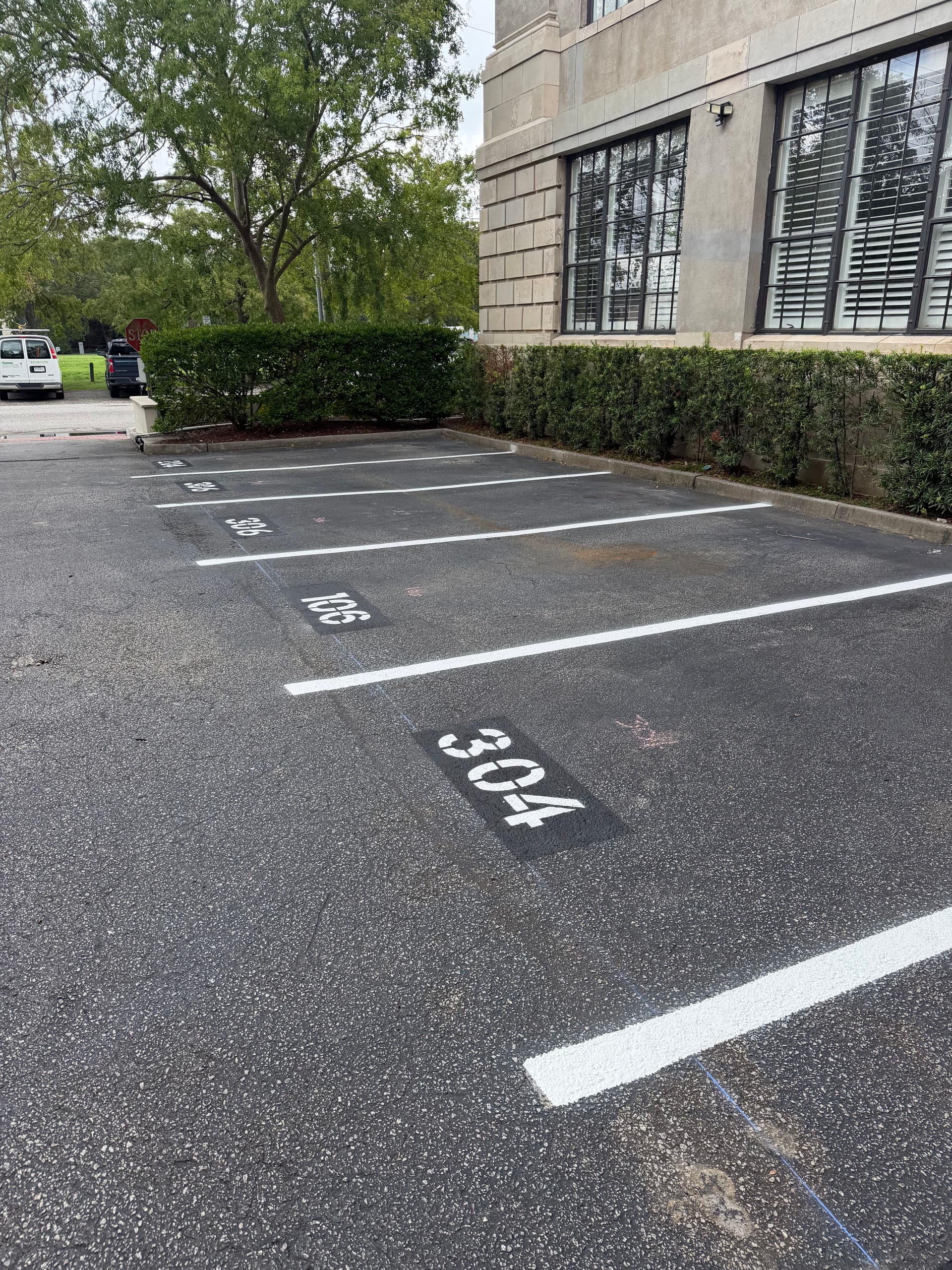 Fresh Striping and Stenciling for a Downtown Charleston Parking Lot image