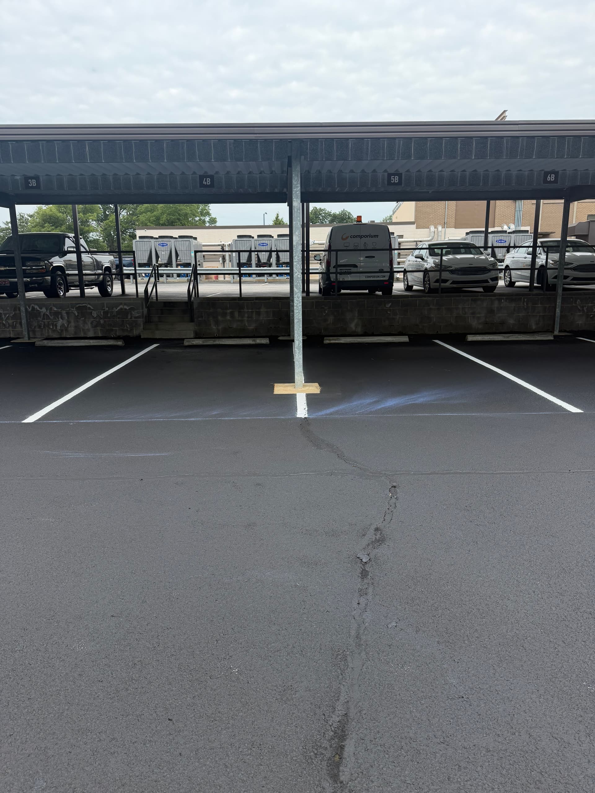 Gallery photos for Crack Sealing and Fresh Striping at Comporium HQ in Rock Hill: Image #8