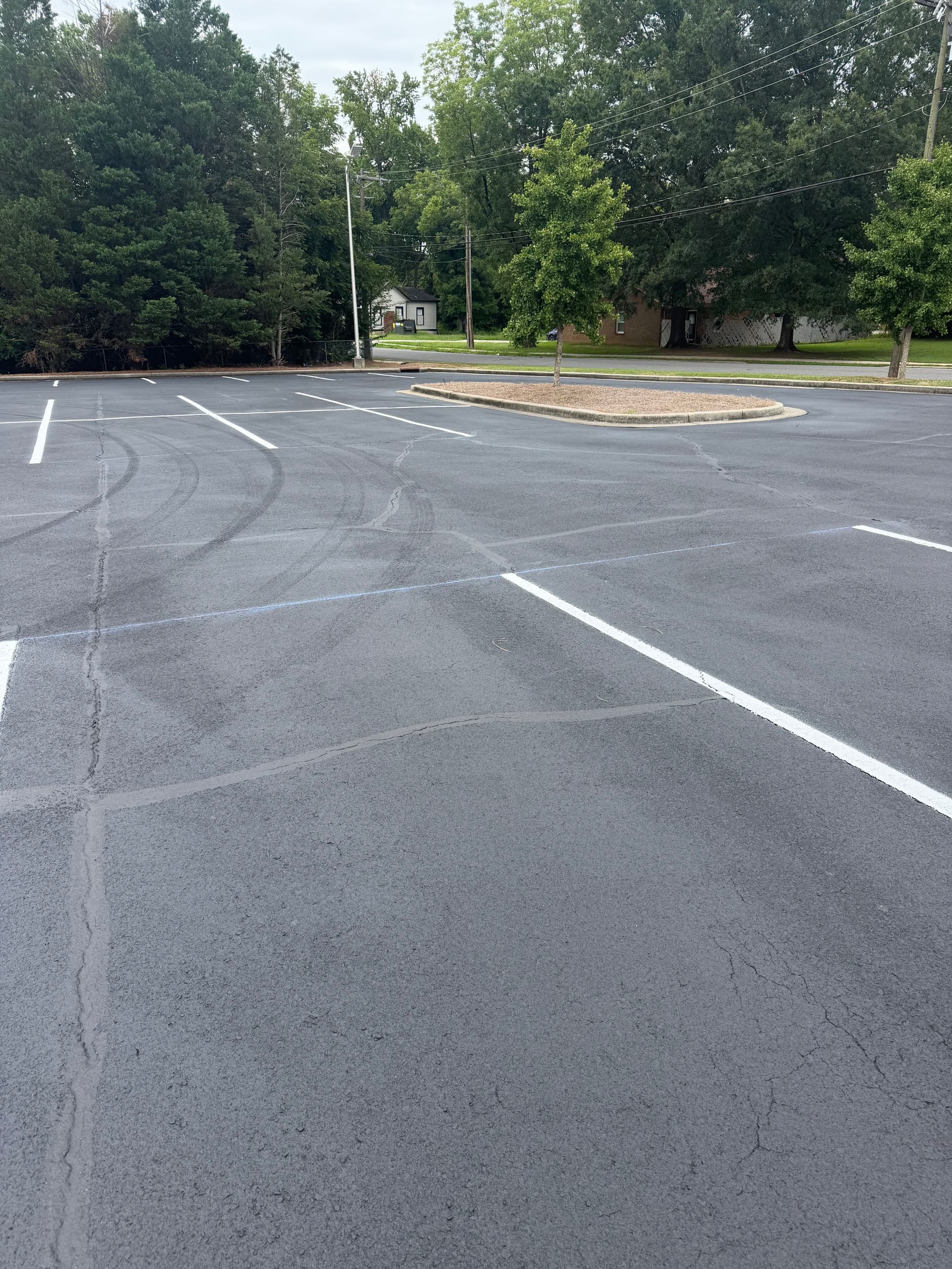 Gallery photos for Crack Sealing and Fresh Striping at Comporium HQ in Rock Hill: Image #4