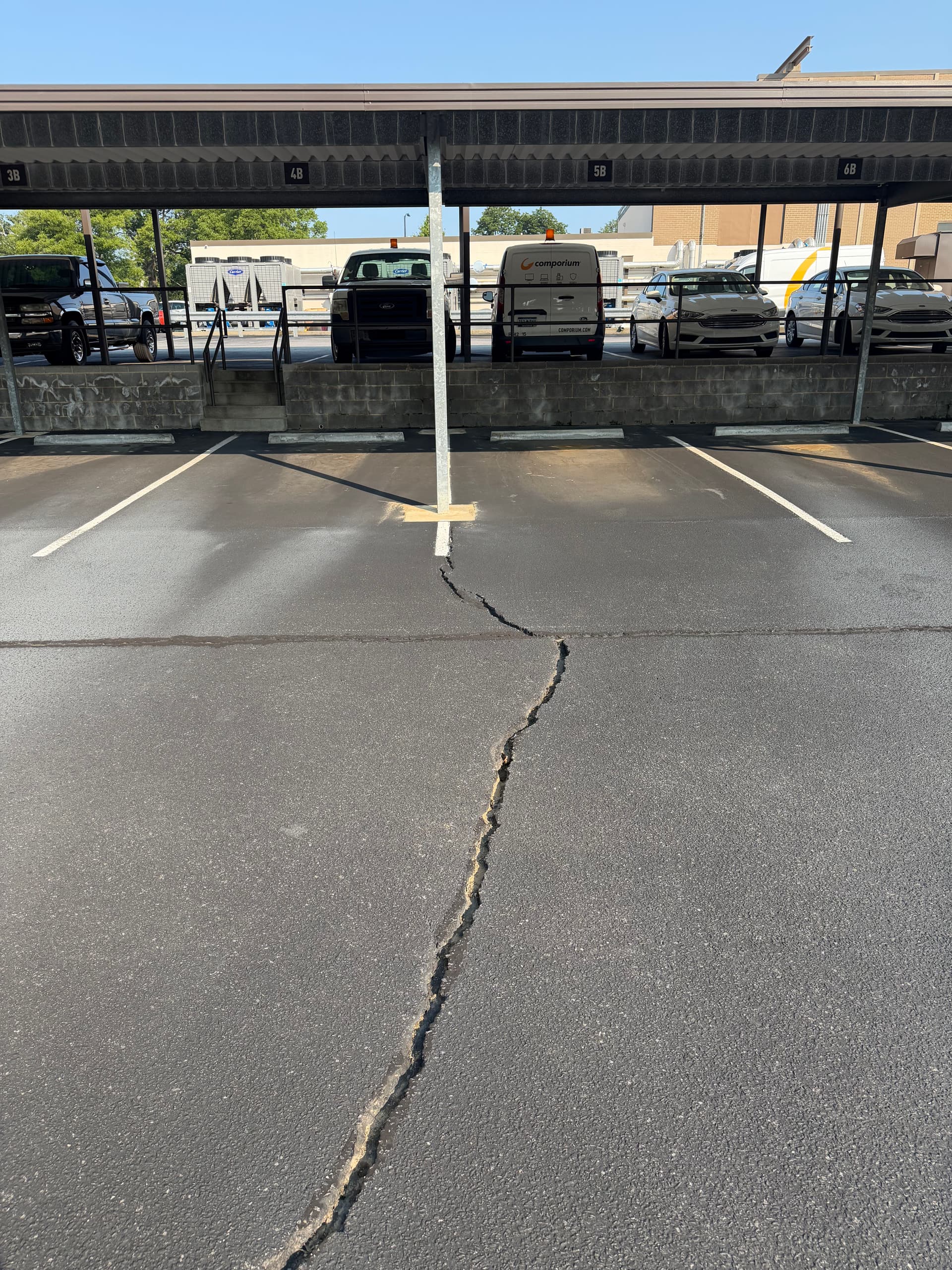 Gallery photos for Crack Sealing and Fresh Striping at Comporium HQ in Rock Hill: Image #7