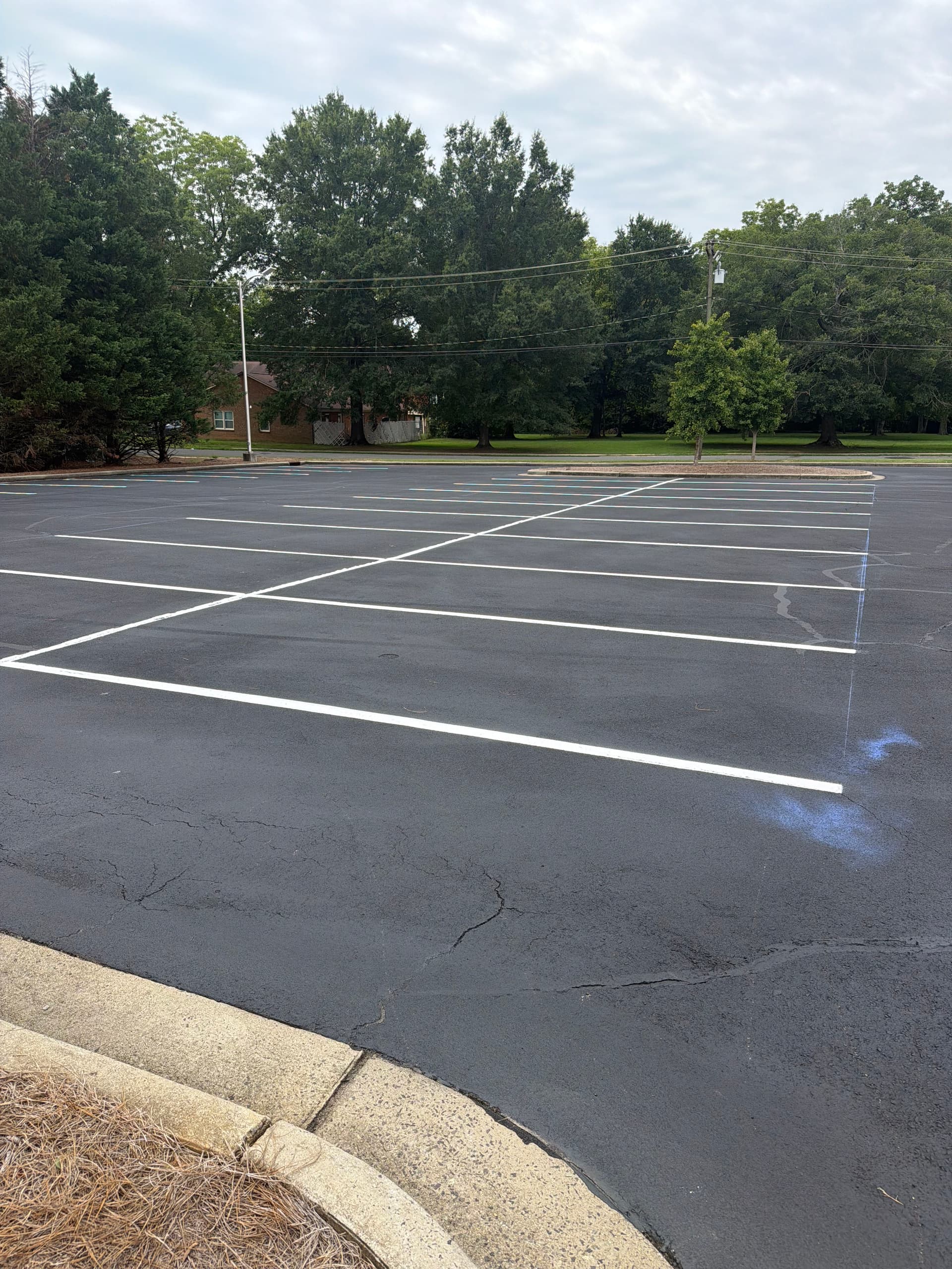 Gallery photos for Crack Sealing and Fresh Striping at Comporium HQ in Rock Hill: Image #2